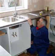 plumberinkitchen.jpg